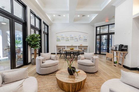 the preserve at ballantyne commons living room with couches and a table